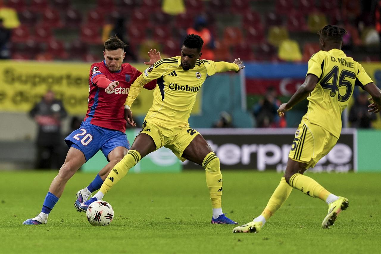Nelson Semedo of Fenerbahce in action against Dennis Politic (20) of FCSB during the UEFA Europa League Week 8 football match between FCSB and Fenerbahce in Bucharest, Romania on Jan. 29, 2026. (AA Photo)