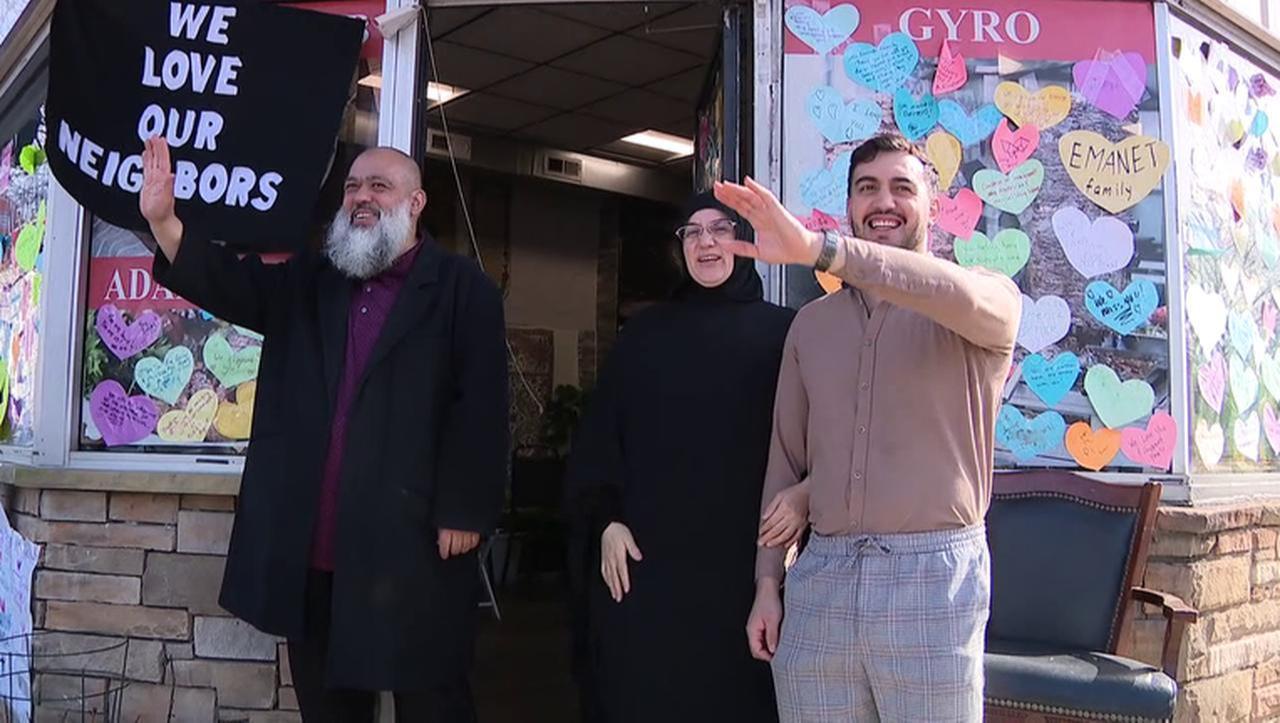 This image captures the moment when restaurant owner Emine Emanet returned to her business, Jersey Kebab, after being released from ICE detention. Neighbors gathered to show their support and welcome her home in Haddon Township, New Jersey. (Photo via Facebook)