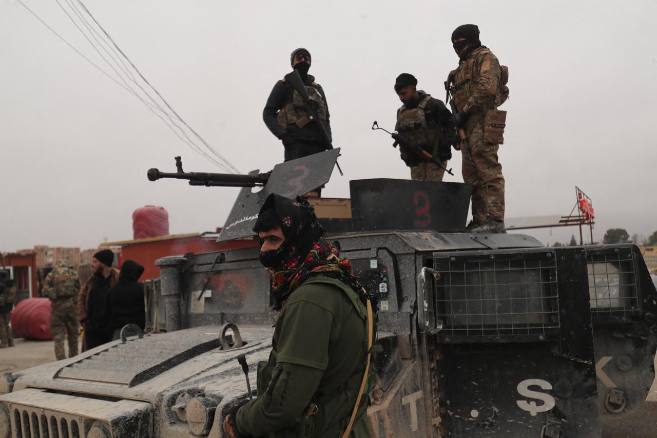 This photo, taken on January 22, 2026, shows YGP/SDF members who took positions in Hasakah. (AFP Photo)