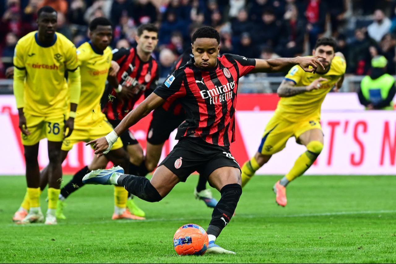 AC Milans French forward #18 Christopher Nkunku shoots a penalty during the Italian Serie A football match between AC Milan and Hellas Verona at the San Siro stadium in Milan, northern Italy, December 28, 2025. (AFP Photo)