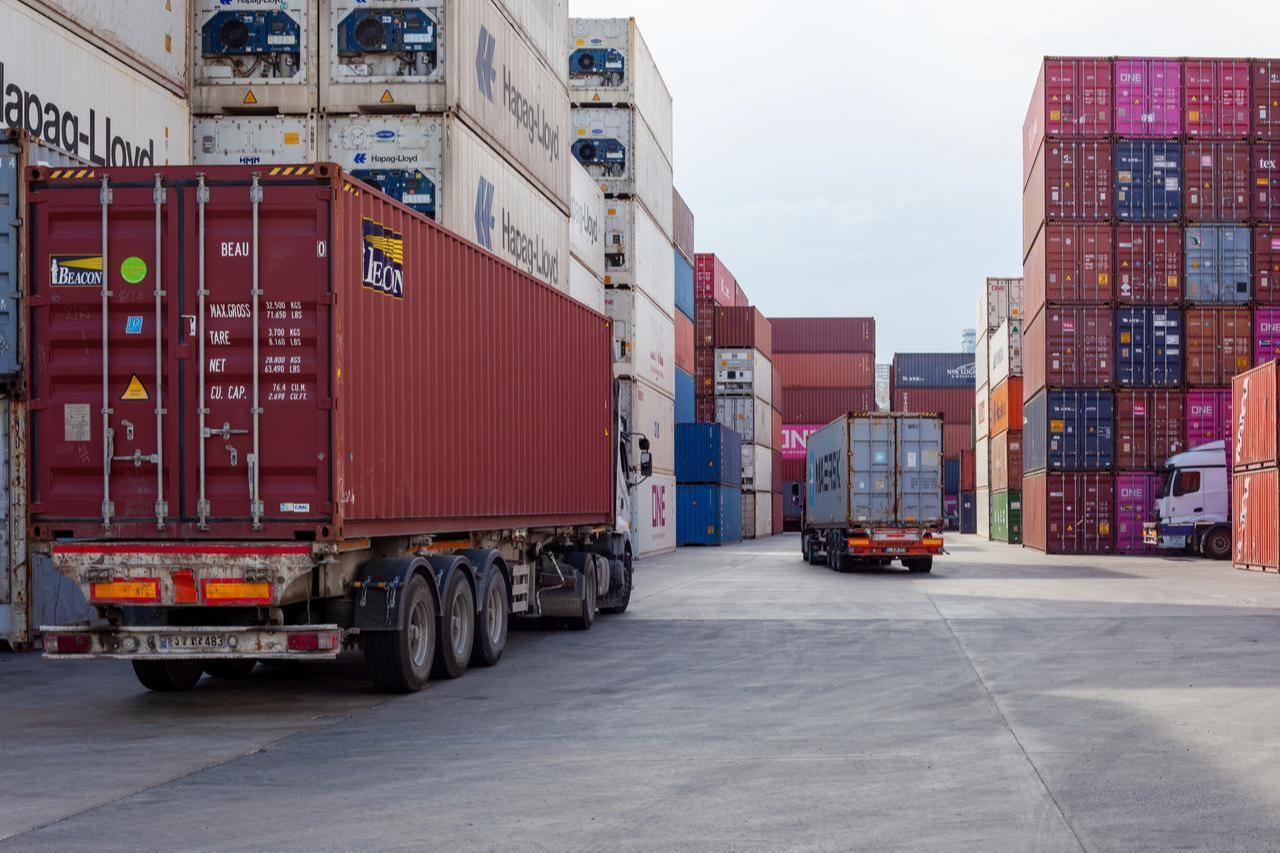 Trucks move through a container yard in Istanbul, Türkiye, July 7, 2023. (Adobe Stock Photo)