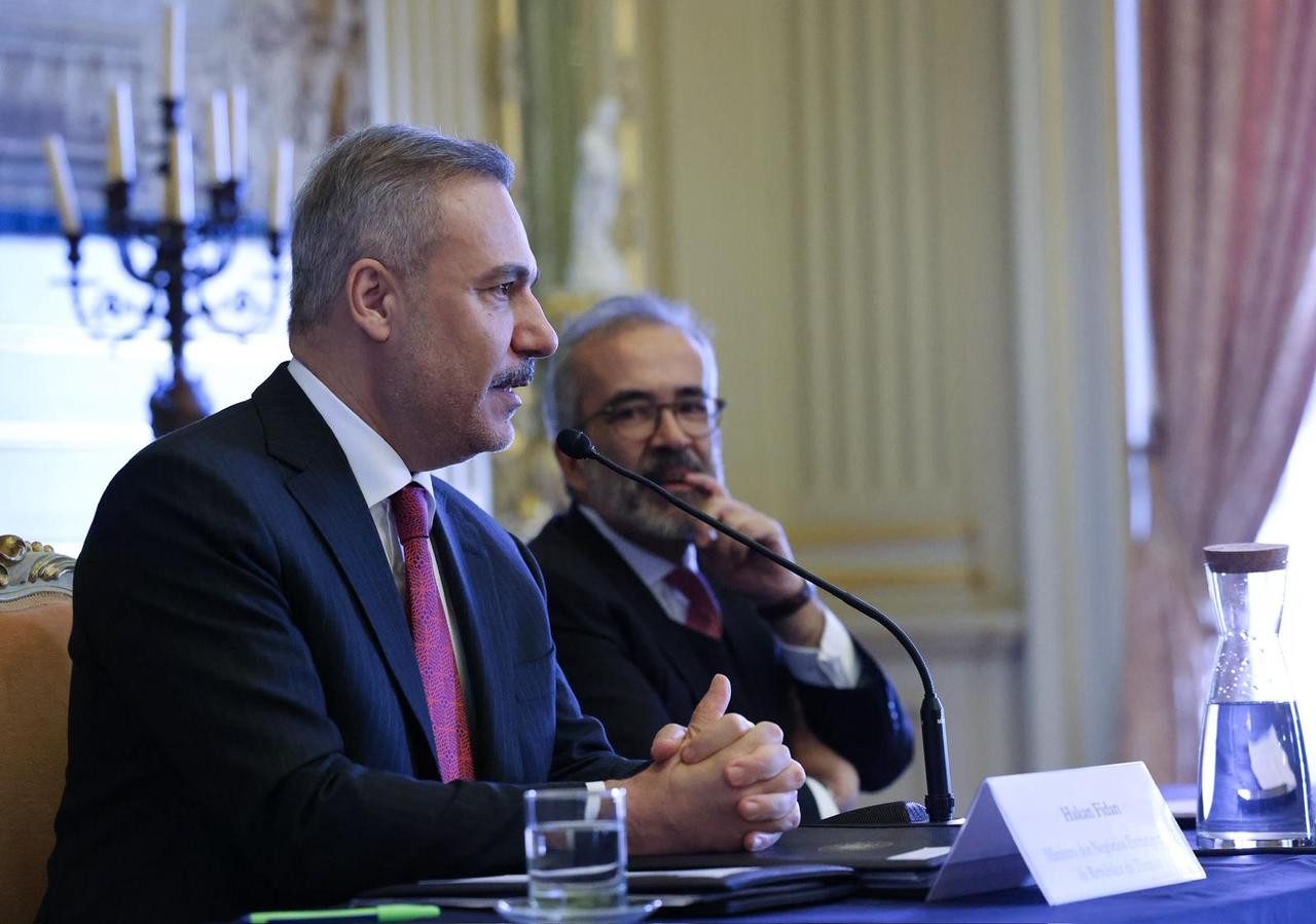 Foreign Minister Hakan Fidan (L) delivers a speech during the Ambassadors Conference organized by the Portuguese Ministry of Foreign Affairs in Lisbon, Portugal on Jan. 5, 2026. (Turkish Foreign Ministry / Handout - AA)