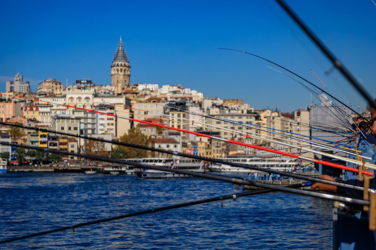 Fishermen cast their lines from the Galata Bridge in Istanbul, Türkiye, accessed on January 6, 2026. (Adobe Stock Photo)