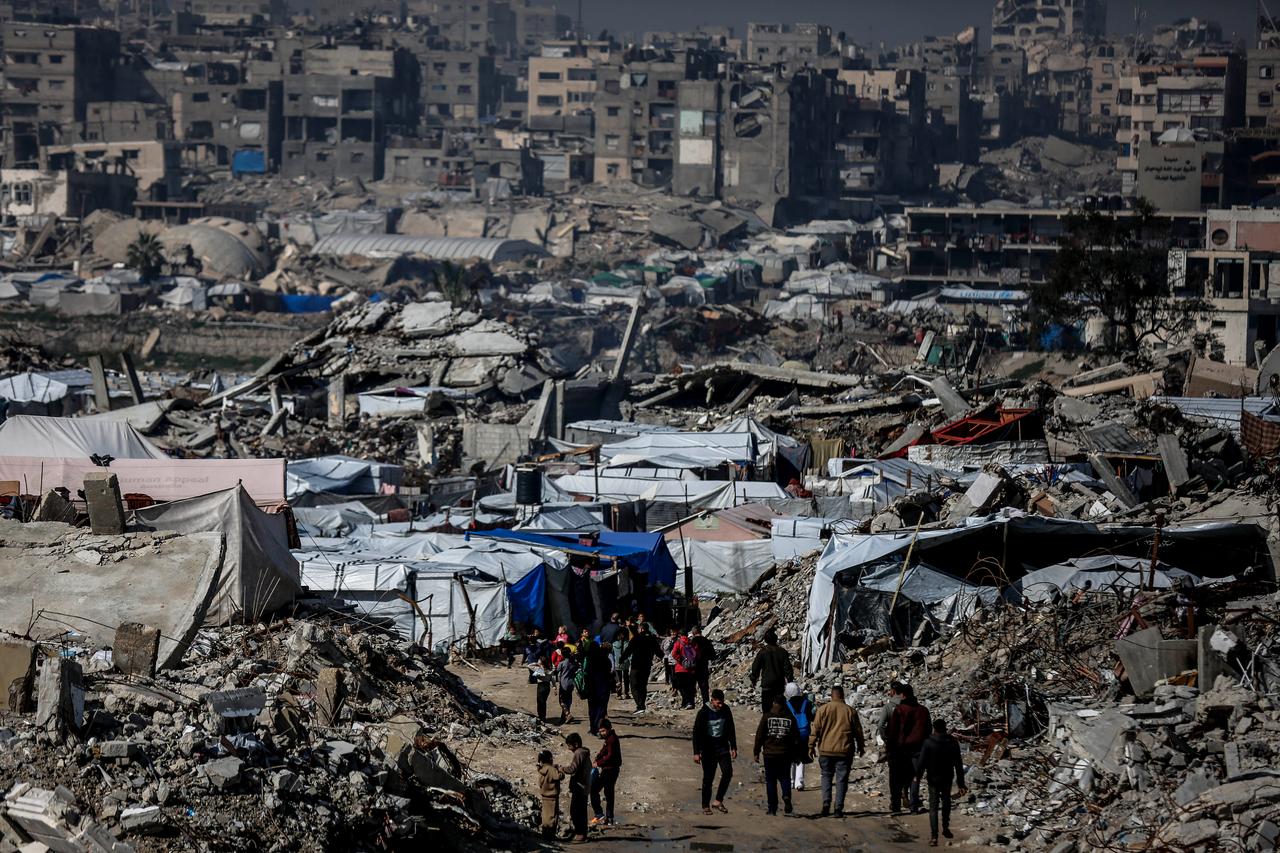 Displaced Palestinians are struggling to carry on with daily life amid the rubble left by Israeli attacks in Jabalia, Gaza on Jan. 06, 2026. (AA Photo)