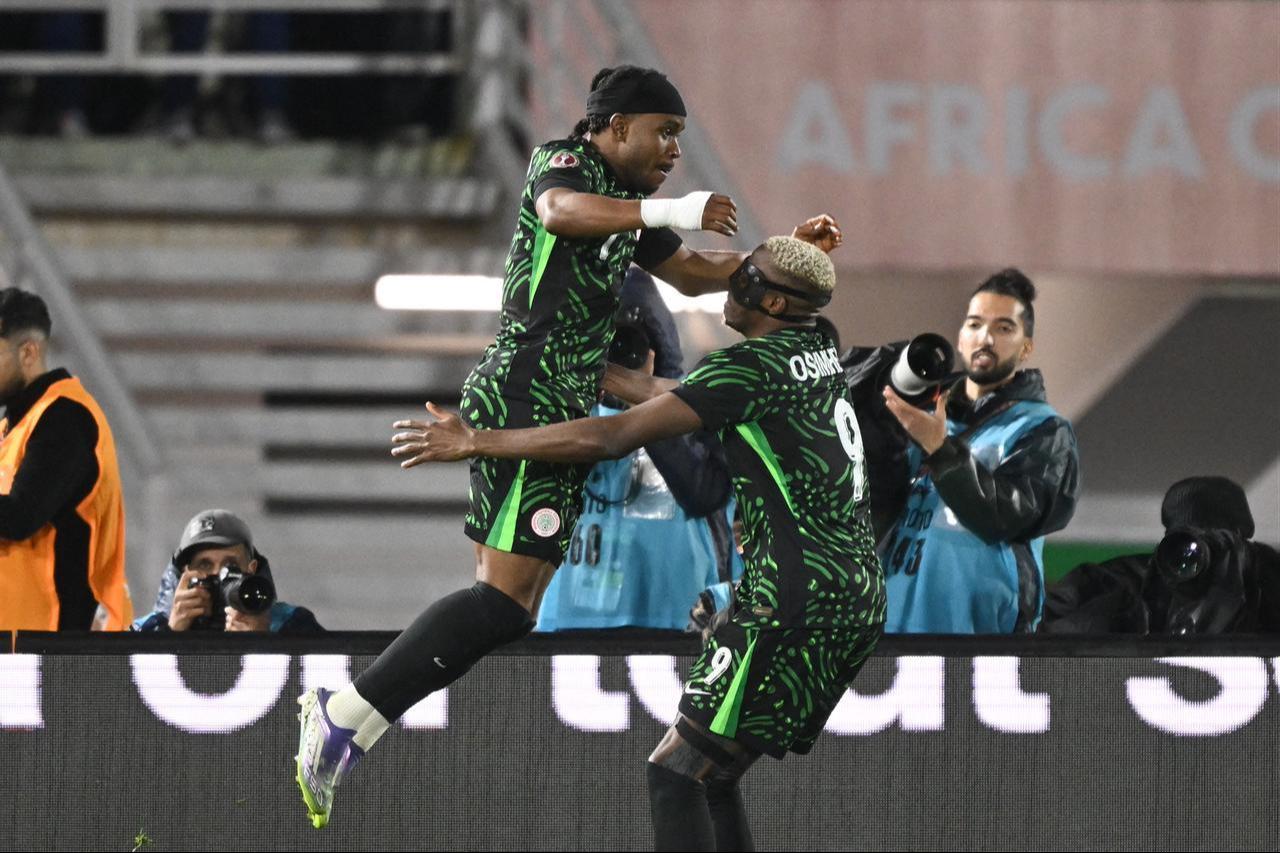 Nigeria's forward #09 Victor Osimhen (R) celebrates with Nigeria's forward #07 Ademola Lookman during the football match between Nigeria and Mozambique at the Sports Complex stadium in Fes, January 5, 2026. (AFP Photo)