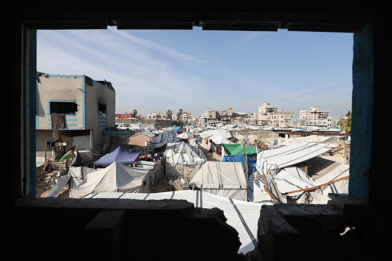 Displaced Palestinians live amid rubble left by Israeli attacks in Gaza City, Gaza, on January 6, 2025. (AA Photo)