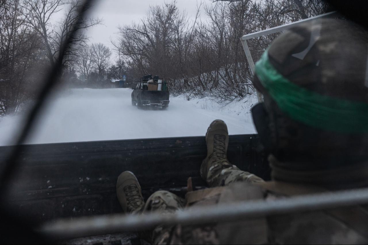 A Ukrainian soldier from the 93rd Brigade in the back of a pickup truck in the direction of Kostiantynivka, Ukraine, 31 December 2025. (AA Photo)