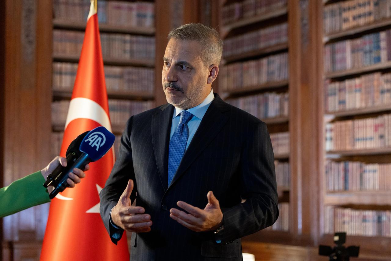 Foreign Minister Hakan Fidan delivers remarks to the media after attending the Ukraine-focused Coalition of the Willing meeting in Paris, France, on Jan. 6, 2026. (AA Photo)