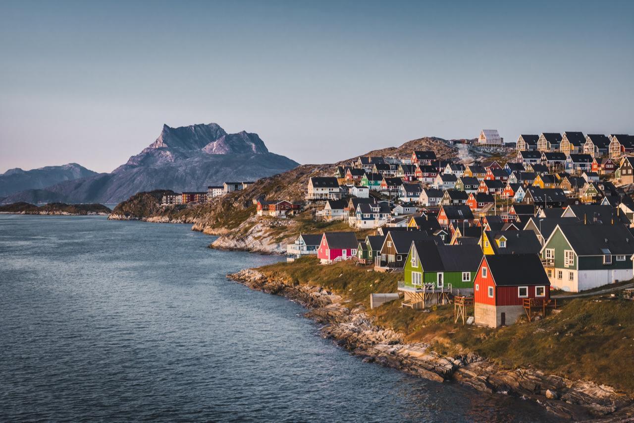Nuuk capital of Greenland with beautiful small colorful houses in Myggedalen (Mosquito valley) during sunrise, accessed on Jan. 7, 2026. (Adobe Stock Photo)