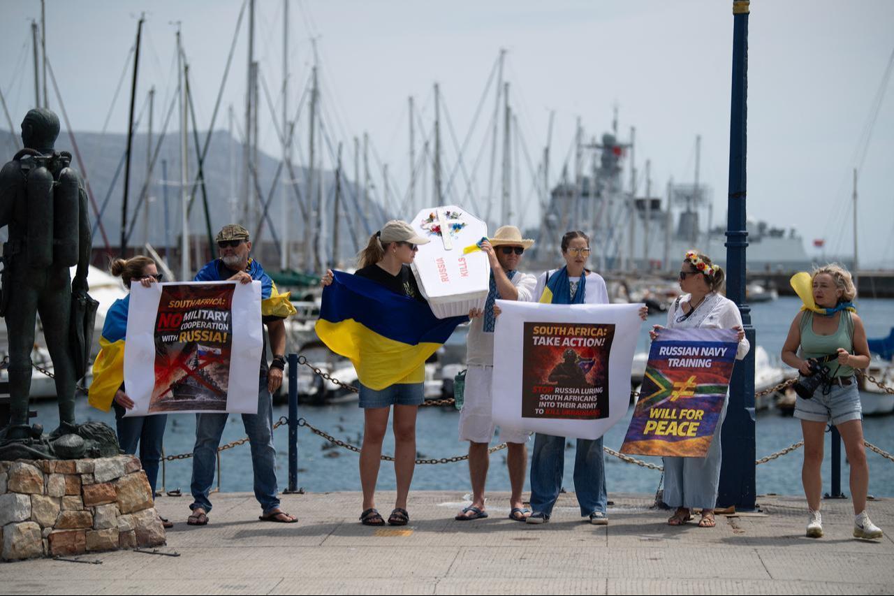 A group of pro-Ukraine protestors protest against Russia’s navy presence in Simon's Town harbour, near Cape Town, on January 9, 2026. (AFP Photo)