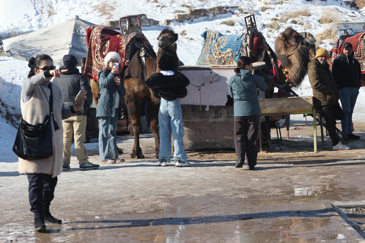 Tourists explore Cappadocia’s unique landscapes and underground cities. Nevsehir, Türkiye, January 9, 2025. (AA Photo)