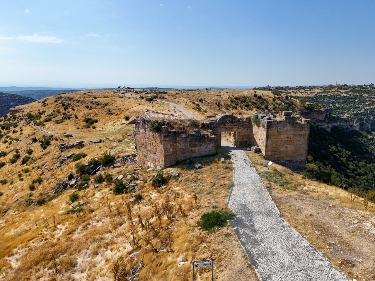 Ruins of the ancient city of Blaundos, where archaeologists uncovered remains of a wall surrounding the northern temple, are seen in Ulubey, Usak, Türkiye, Oct. 1, 2026. (AA Photo)