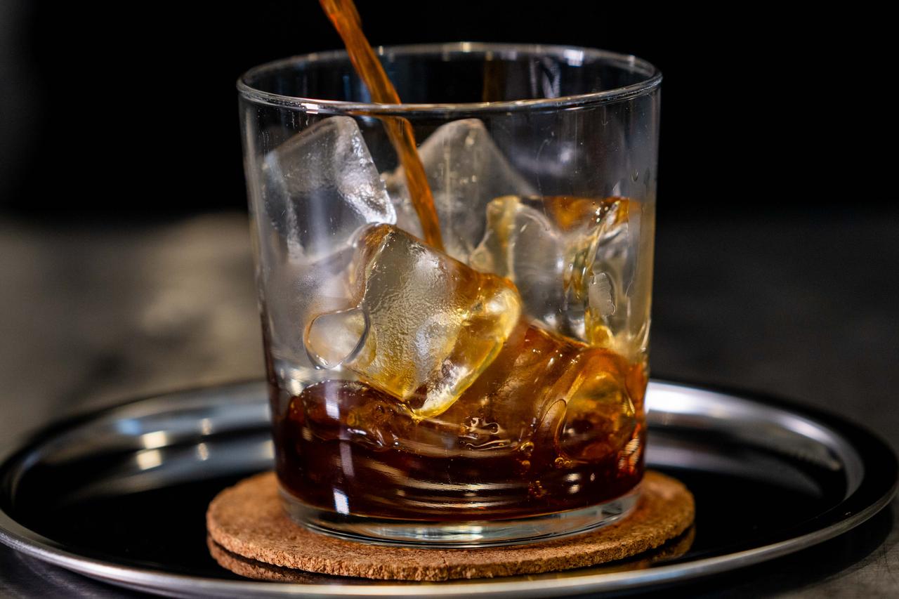 Coffee is poured over ice in a glass on World Coffee Day, Oct. 1, 2026. (AA Photo)