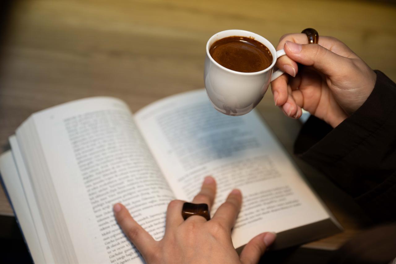A person holds a cup of coffee on World Coffee Day, Oct. 1, 2026. (AA Photo)