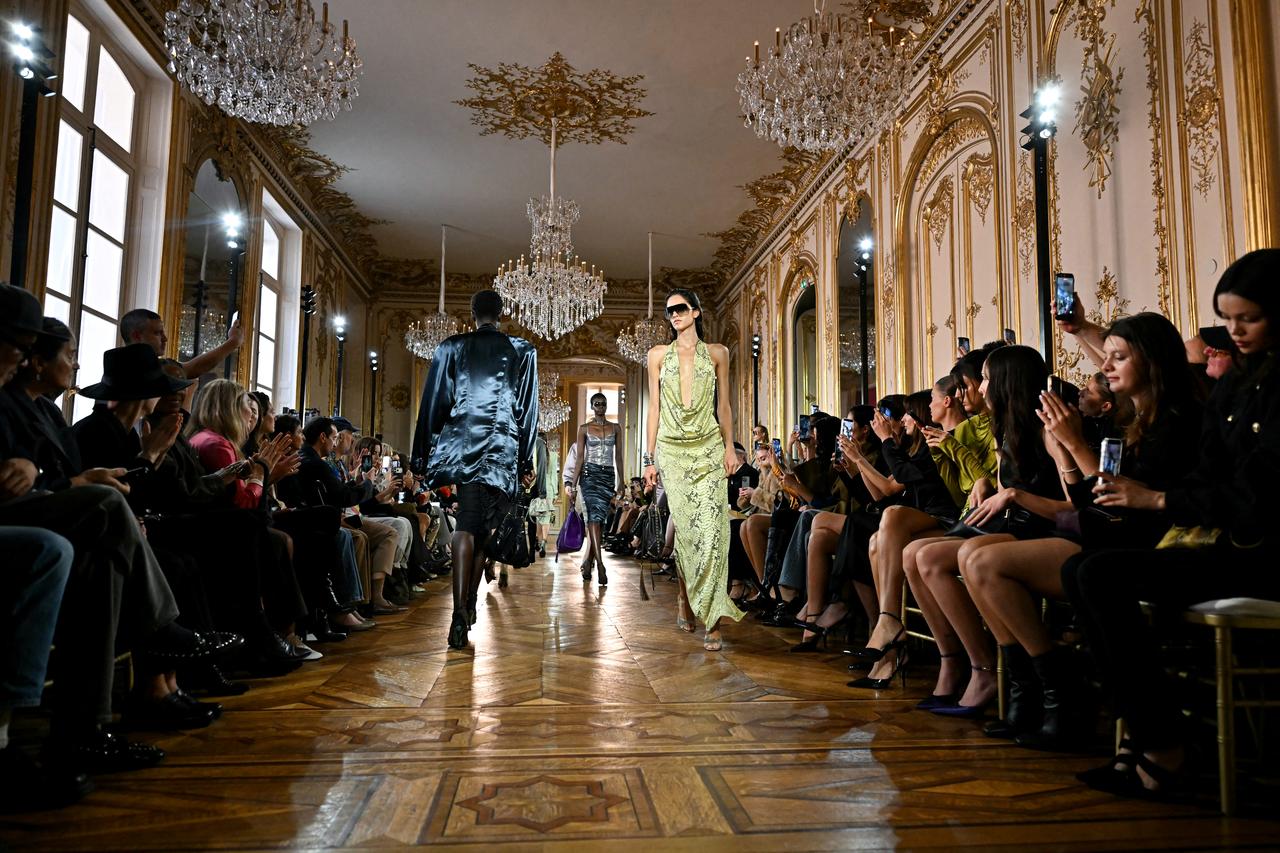 Models present creations during the Balmain Spring/Summer 2027 womenswear show at Paris Fashion Week in Paris, France, Sept. 30, 2026. (AFP Photo)