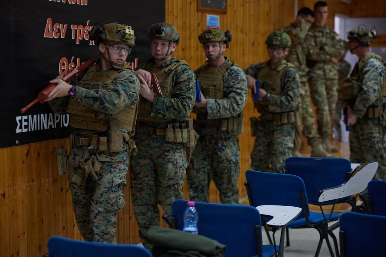 The image shows U.S. Marines with the Fleet Antiterrorism Security Team (FAST) Company Europe conducting training alongside the Greek Cypriot forces in Pyrga, Southern Cyprus, on February 2, 2026. (Photo via U.S. Marine Corps via DVIDS)