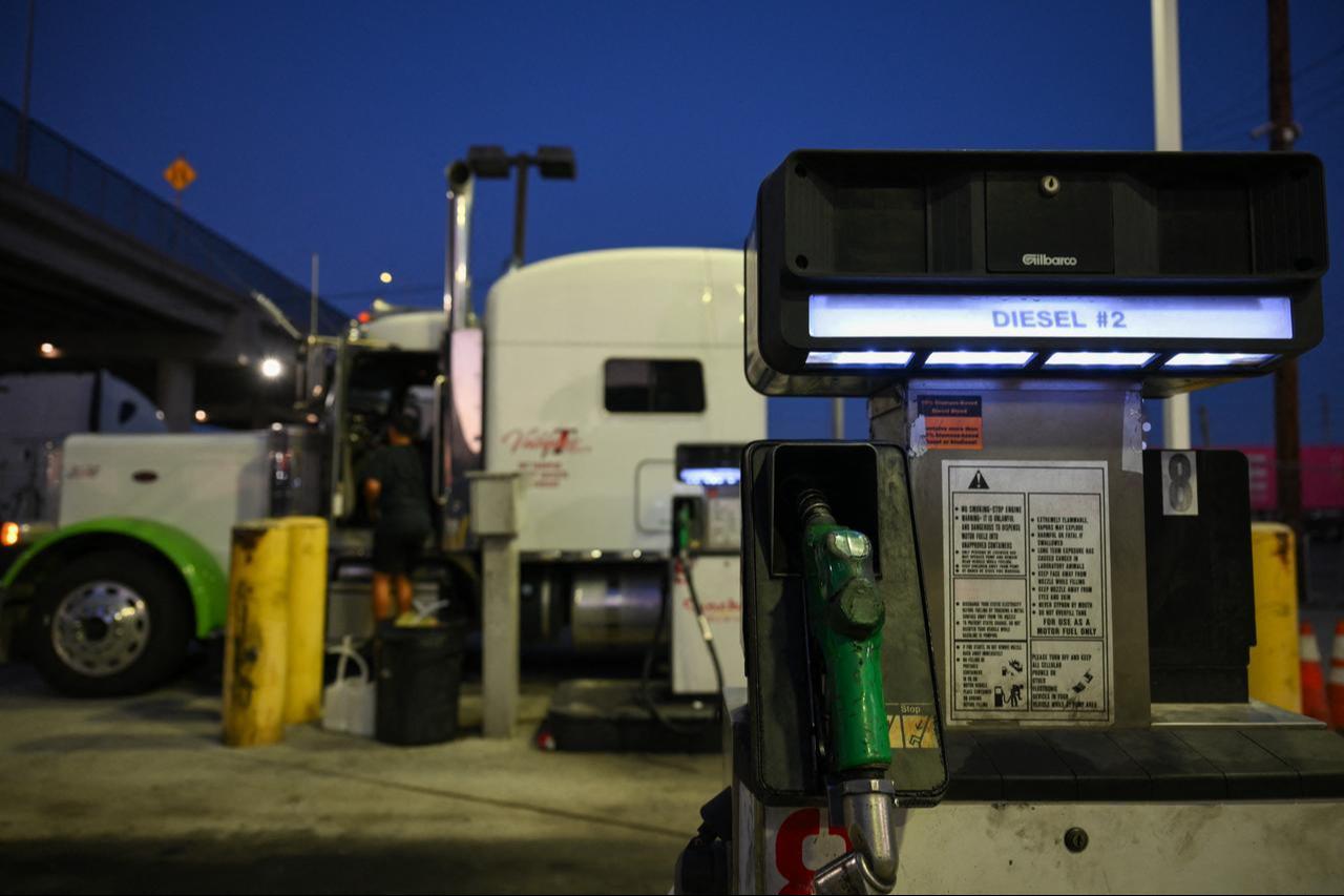 A truck sits parked at a diesel fuel pump with prices above $8 per gallon at a truck stop in the Wilmington neighborhood of Los Angeles, California, on Sept. 22, 2026. (AFP Photo)