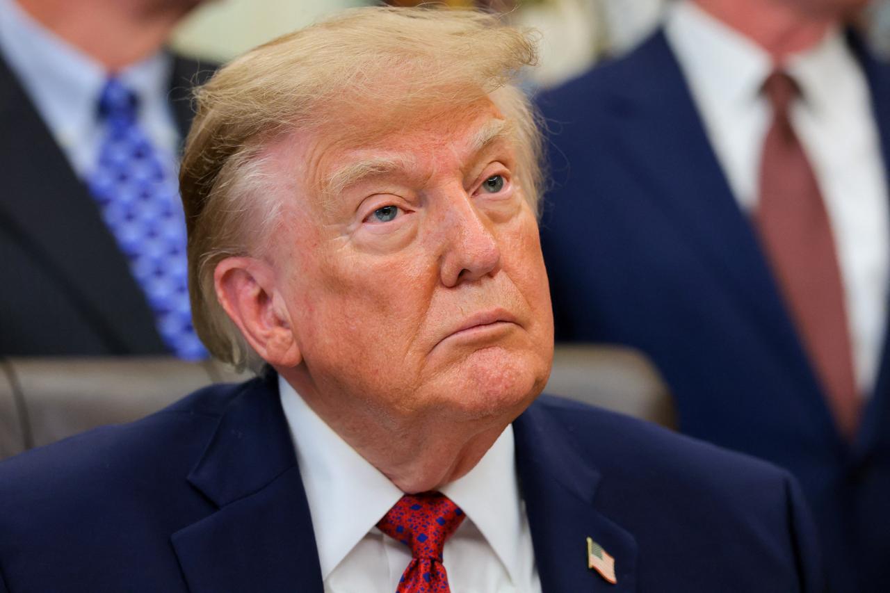 U.S. President Donald Trump looks on during an announcement in the Oval Office of the White House on September 30, 2026, in Washington, DC. (AFP Photo)