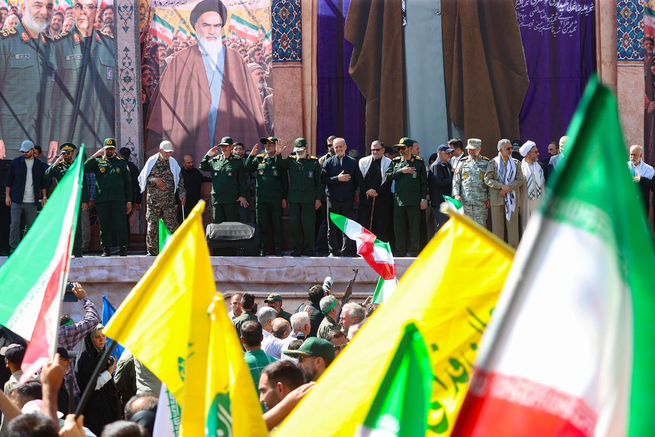 Iranian President Masoud Pezeshkian attends as demonstrators fill the area between Imam Hossein Square and Revolution Square, carrying Hezbollah and Iranian flags and chanting slogans against the US and Israel in Tehran, Iran, on September 18, 2026. (AA Photo)