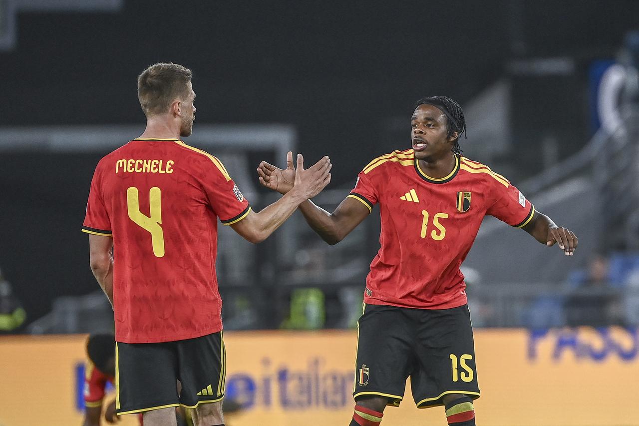 Brandon Mechele (L) and Nathan Ngoy (R), of Belgium, congratulate each other at the end of the UEFA Nations League Group A1 League phase football match between Italy and Belgium at the Olympic stadium in Rome, Italy, on September 25, 2026. Belgium defeated Italy 2-0. (AA Photo)