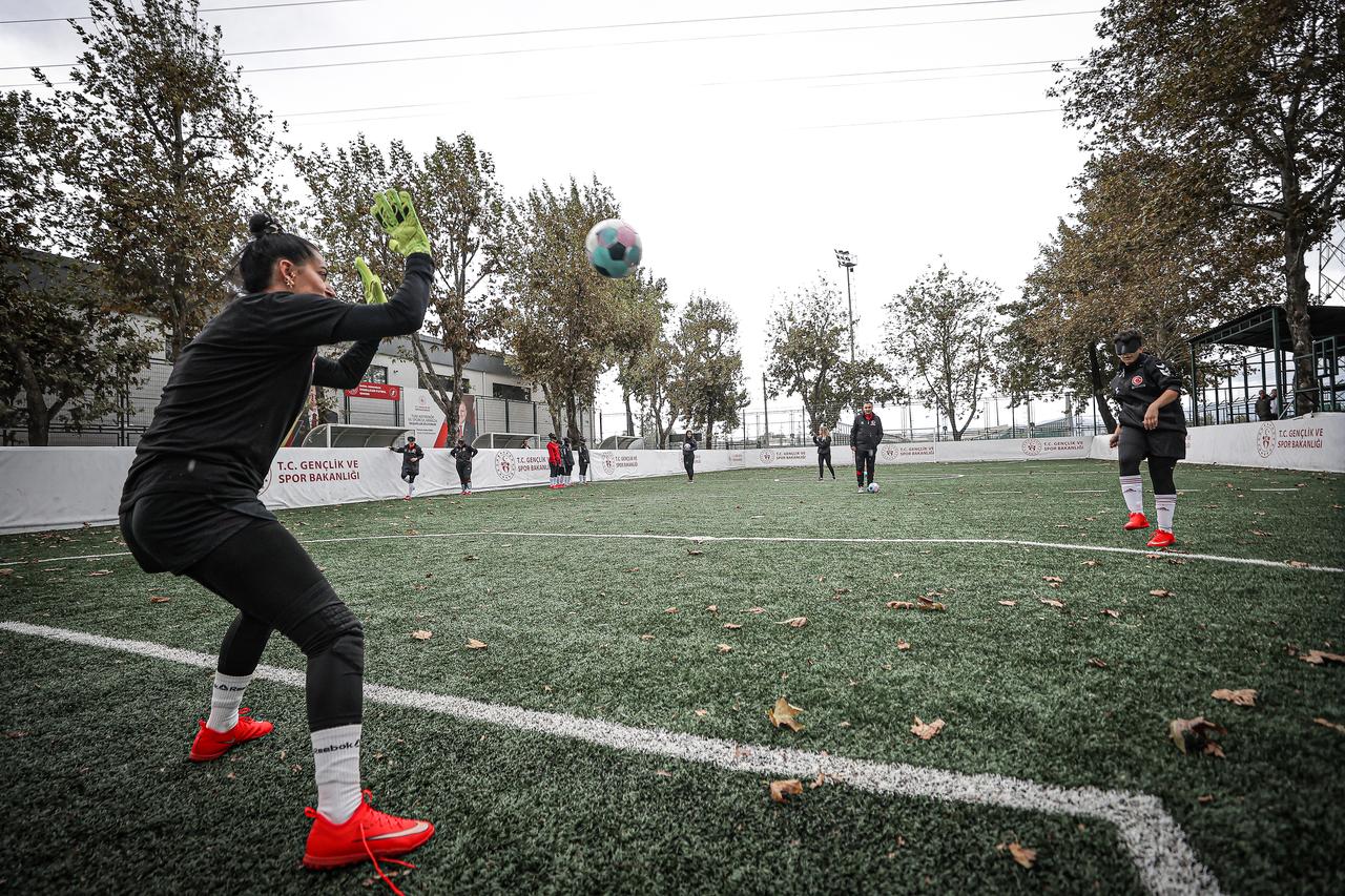 A goalkeeper from Türkiye's visually impaired women's national football team catches the ball during a training session in Bursa, Türkiye, ahead of the Women's Blind Football European Championship, Oct. 1, 2026. (AA Photo)