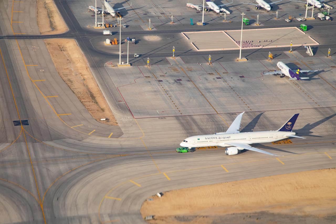 A Saudi Arabian Airlines plane taxis at King Khalid International Airport in Riyadh, Saudi Arabia, March 5, 2023. (Adobe Stock Photo)