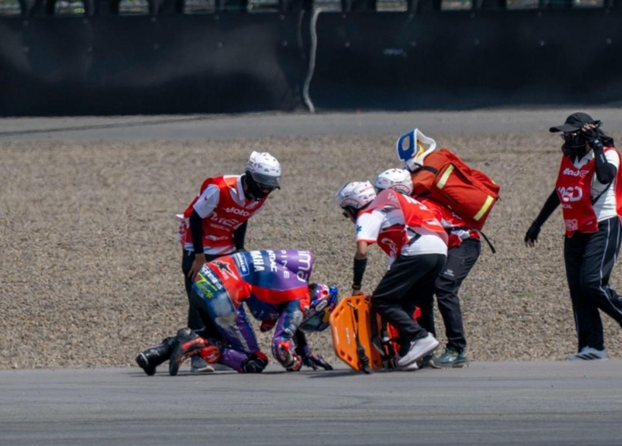 Turkish MotoGP rider Toprak Razgatlioglu is attended to by track marshals following a crash during the second free practice session at the Mandalika circuit in Indonesia, Oct. 10, 2026. (Photo via GPOne)