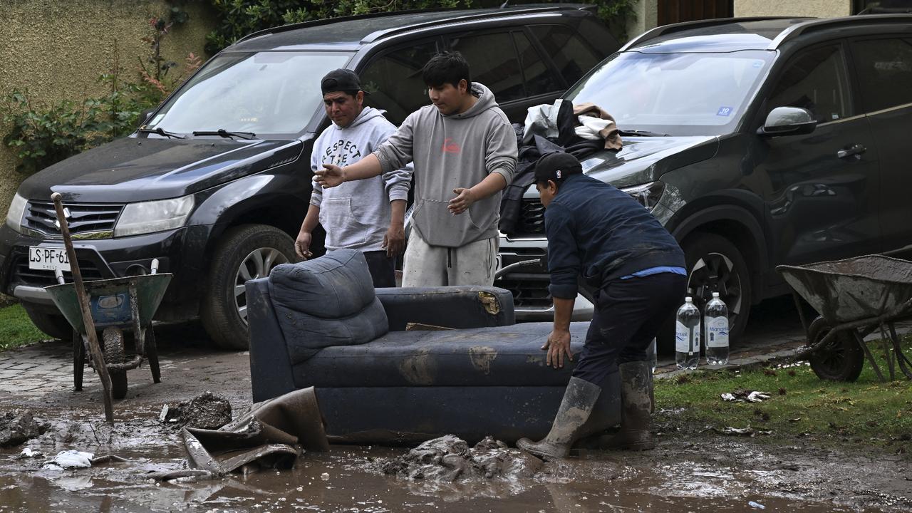 Cleanup continues in Santiago after floods and mudslides injure 6