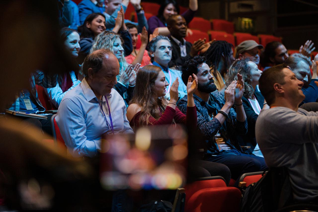 Audience members applaud during a conference, presentation or public event. (Adobe Stock Photo)