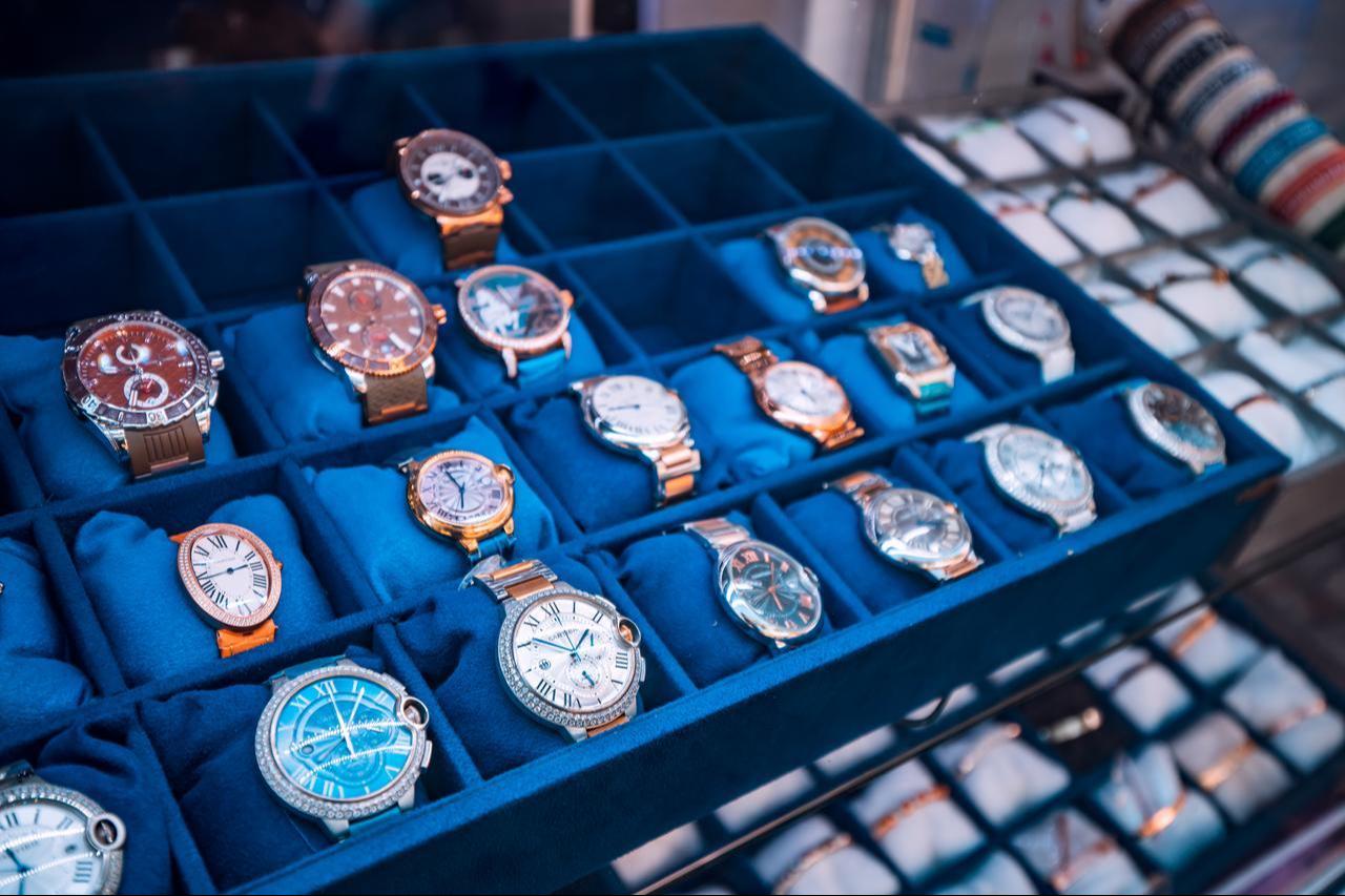 The photo shows various vintage, retro, and modern luxury wristwatches on display in a store window in Antalya, Türkiye, on June 21, 2022. (Adobe Stock Photo)