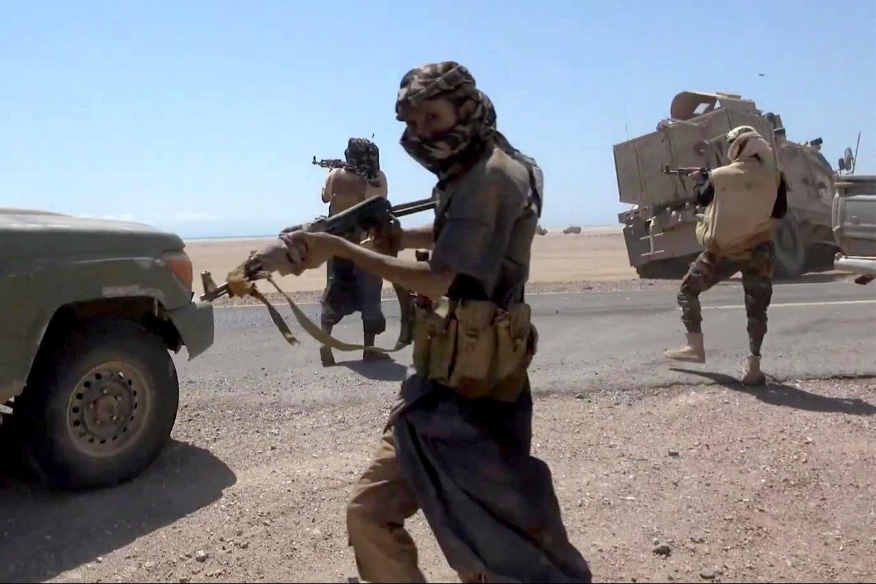 This screen grab taken from video footage released by the pro-Yemeni government Southern Giants Brigades on October 6, 2026 shows fighters during clashes with Houthis near the Bab al-Mandeb Strait in Taiz province. (AFP Photo/Yemen Giants Brigades Media Centre/Handout)