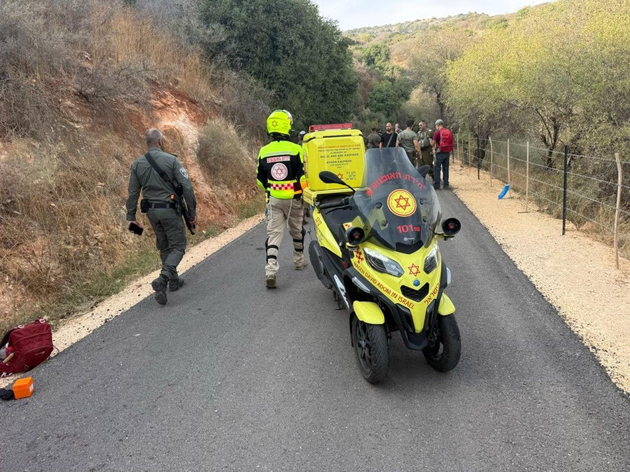 The photo shows Israeli Magen David Adom members at the scene where unexploded ordnance blew up in northern Israel near the border with Lebanon on Oct. 12, 2026. (Photo via Telegram/mdaisrael)