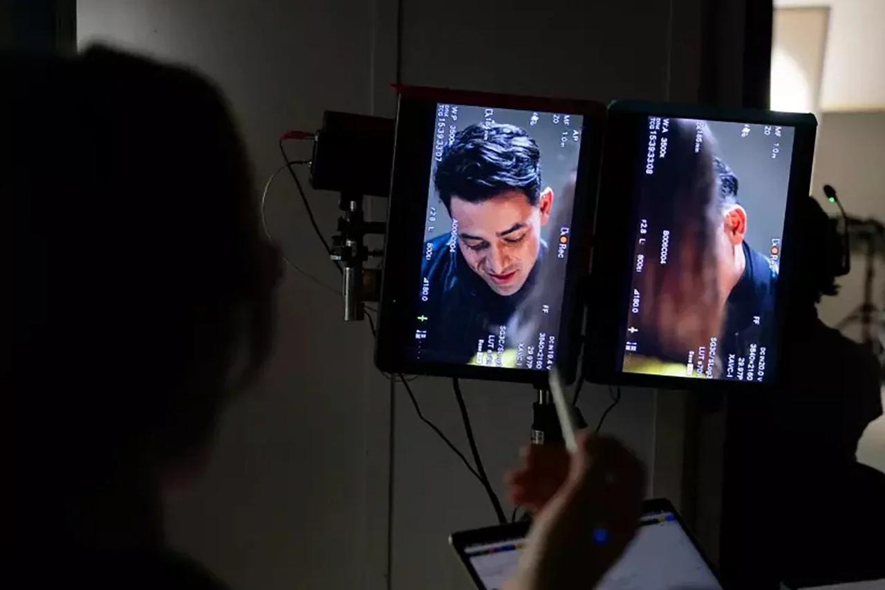 A crew member watches a screen during the filming of a micro drama in Burbank, California, US. (Photo via Los Angeles Times/TNS)