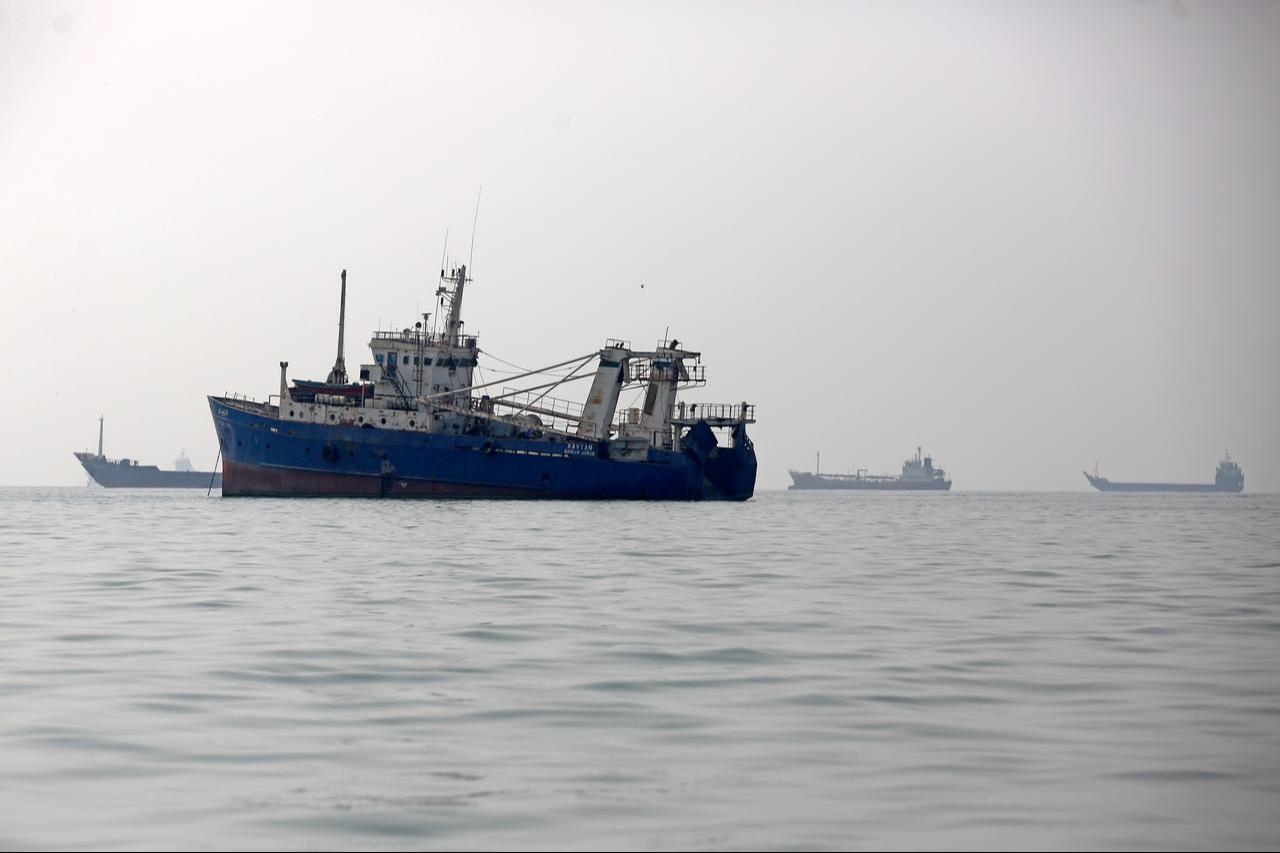 Commercial vessels and oil tankers sit anchored in the waters off Bandar Abbas in southern Iran's Hormozgan Province on September 9, 2026. (AA Photo)