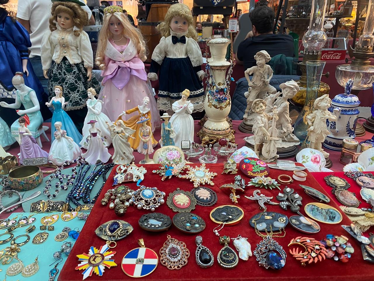 Antique dolls, porcelain figurines, jewelry and decorative objects are displayed at the Antique Days event in Ankara, Türkiye, Oct. 12, 2026. (IHA Photo)