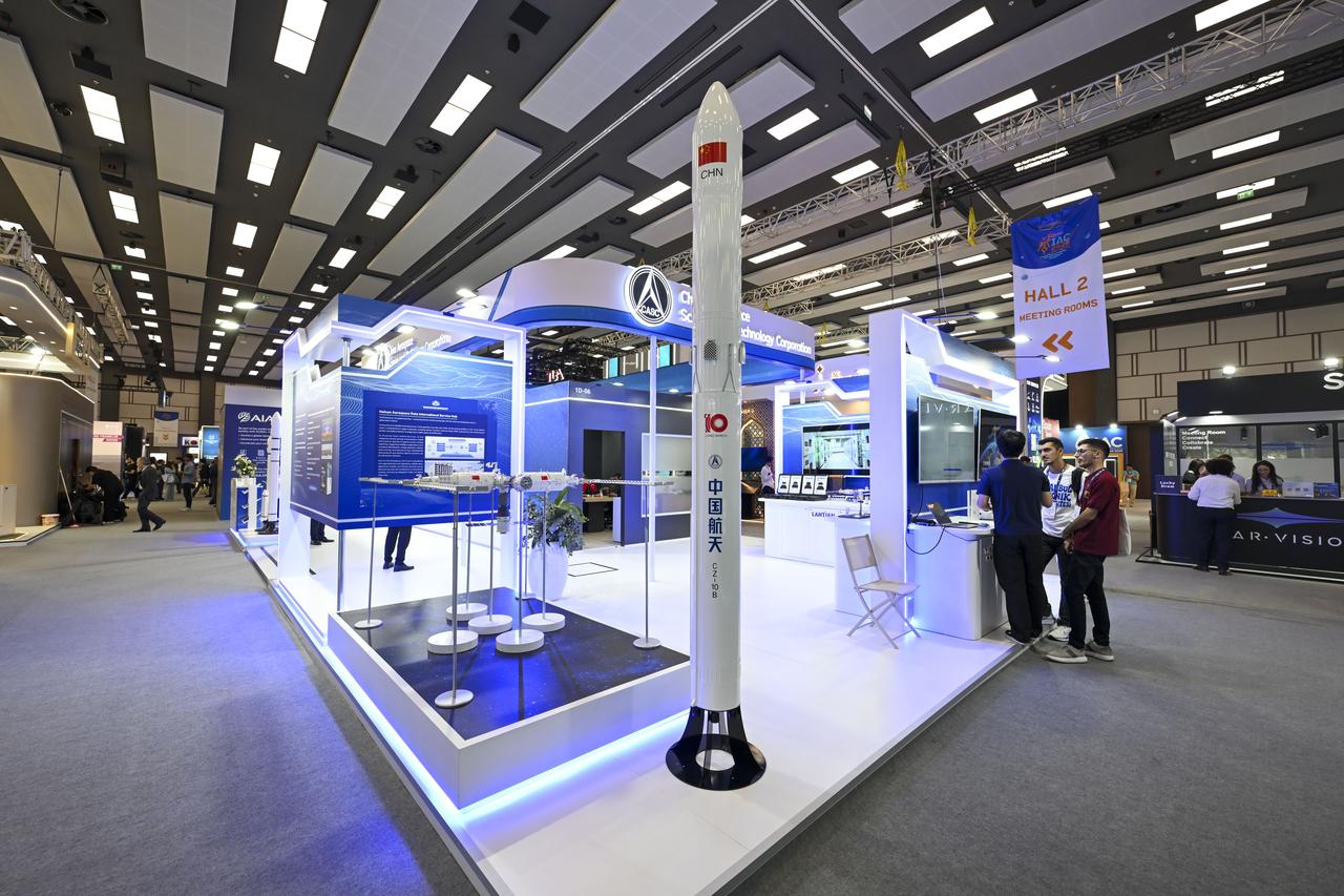 Participating countries showcase their latest aerospace technologies and innovations at exhibition booths during the 77th International Astronautical Congress (IAC) at the NEST Convention Center in Antalya, Türkiye, Oct. 7, 2026. (AA Photo)