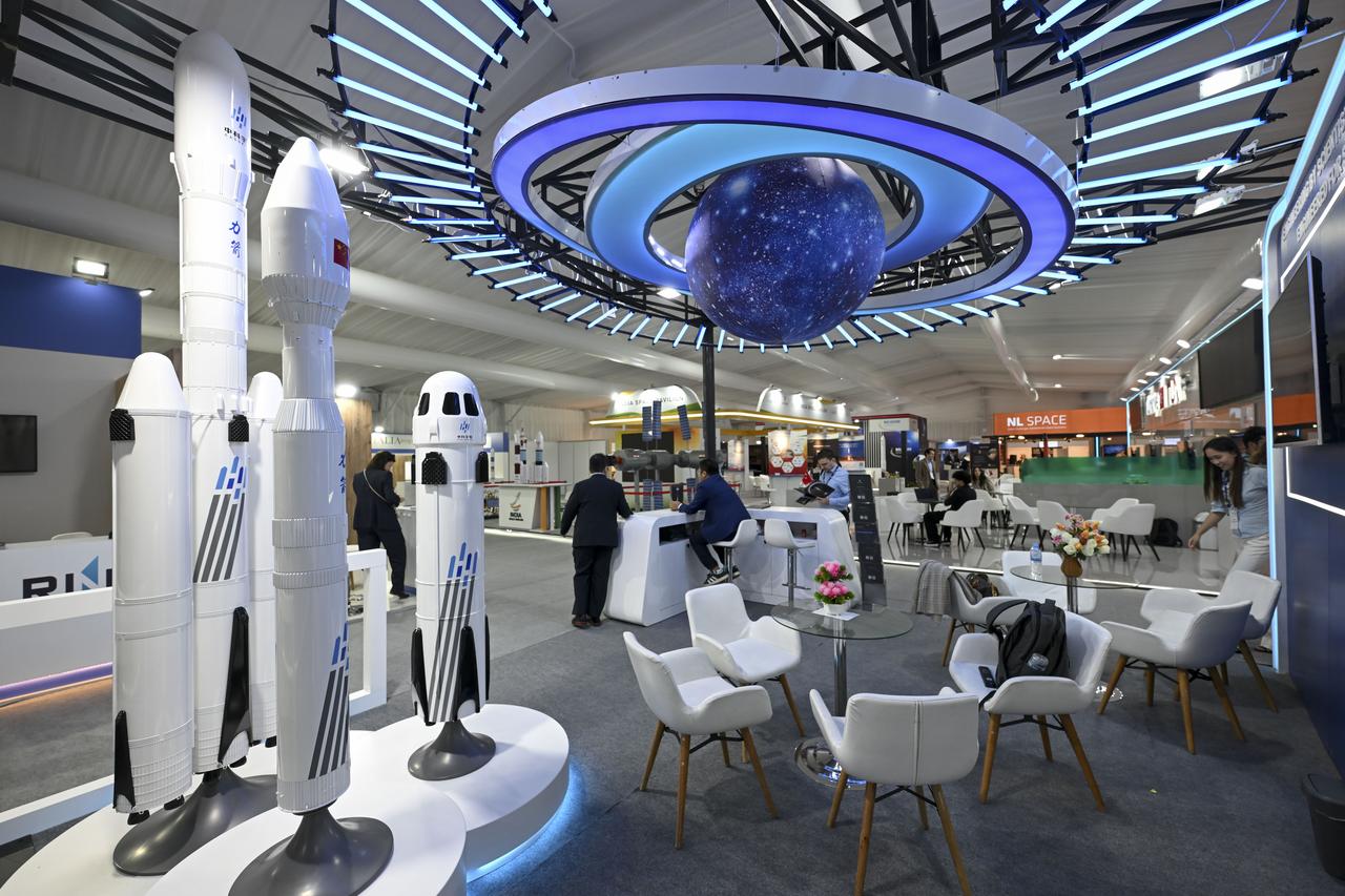 Participating countries showcase their latest aerospace technologies and innovations at exhibition booths during the 77th International Astronautical Congress (IAC) at the NEST Convention Center in Antalya, Türkiye, Oct. 7, 2026. (AA Photo)