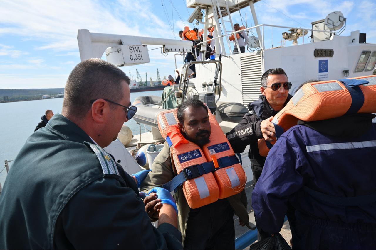 Crew members from a vessel struck by drones in Bulgaria's exclusive economic zone arrive at the port of Varna after being rescued on October 6, 2026. (AFP Photo)