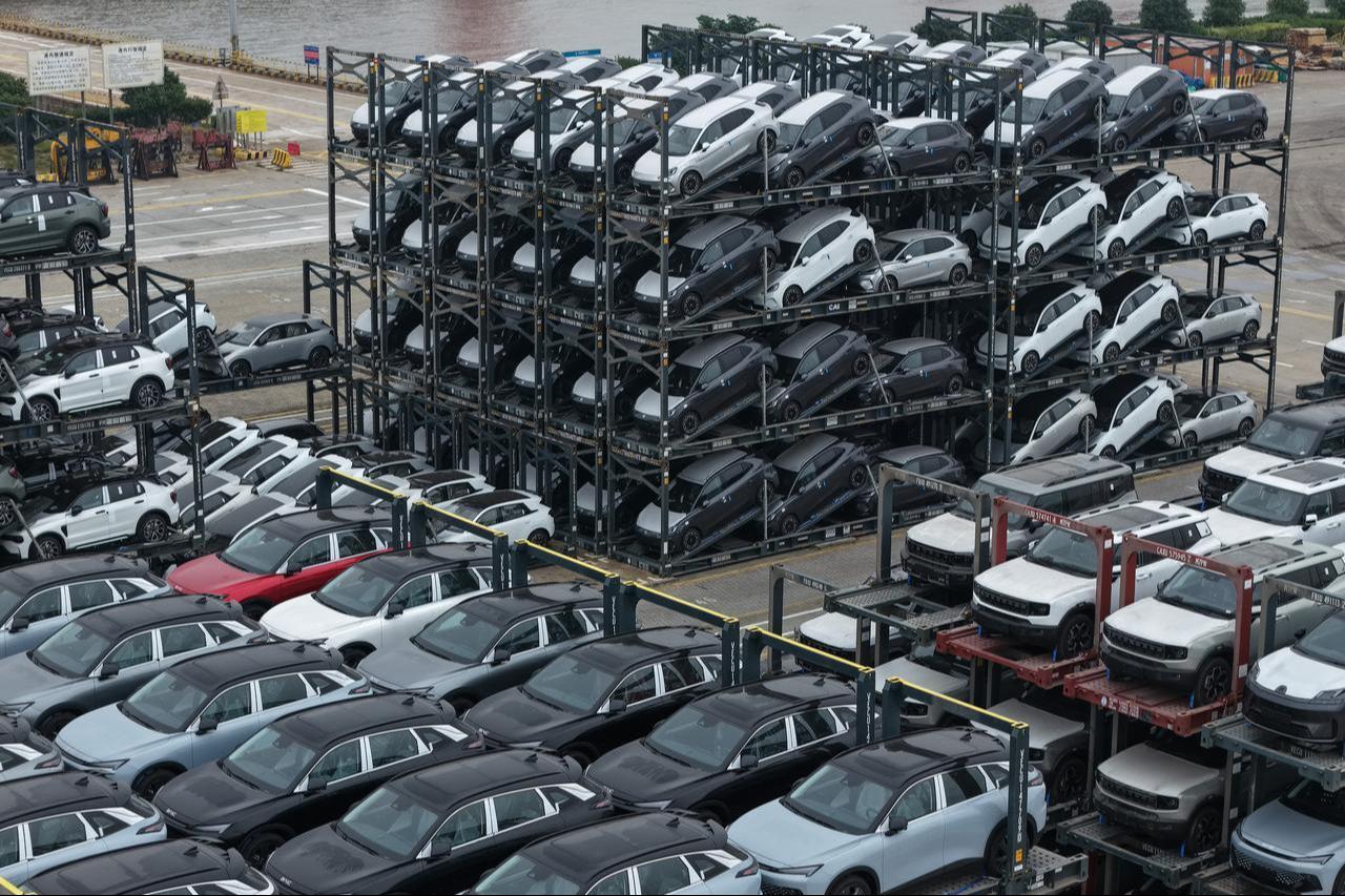 Chinese-made cars, including BYD, BAIC, Jetour, Lynk & Co, and MG, are seen in specialized vehicle racks in preparation for loading onto ships for export at the Taicang Port area of Suzhou Port in China’s eastern Jiangsu province, October 12, 2026. (AFP Photo)