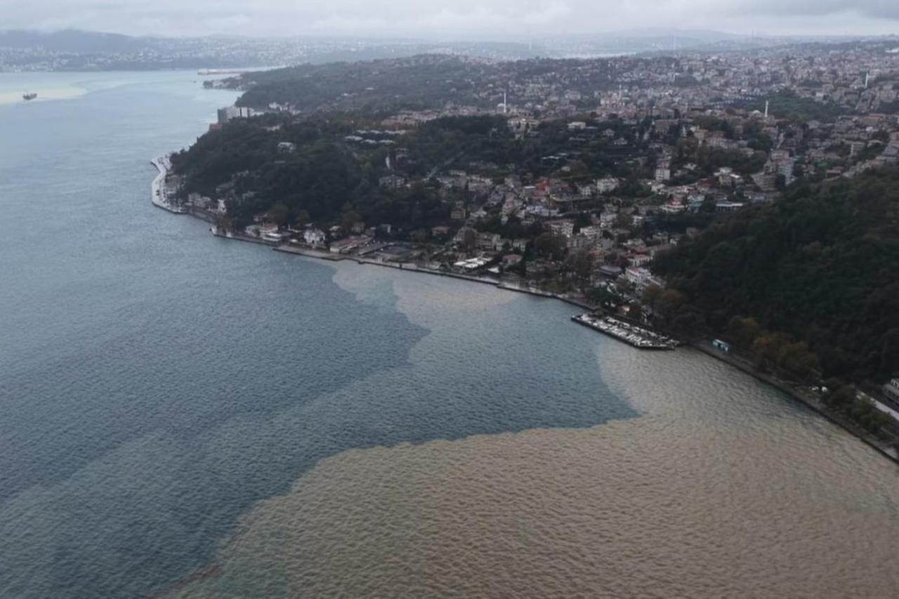 Heavy rain sends mud into Istanbul’s Bosphorus, creating a stark color divide