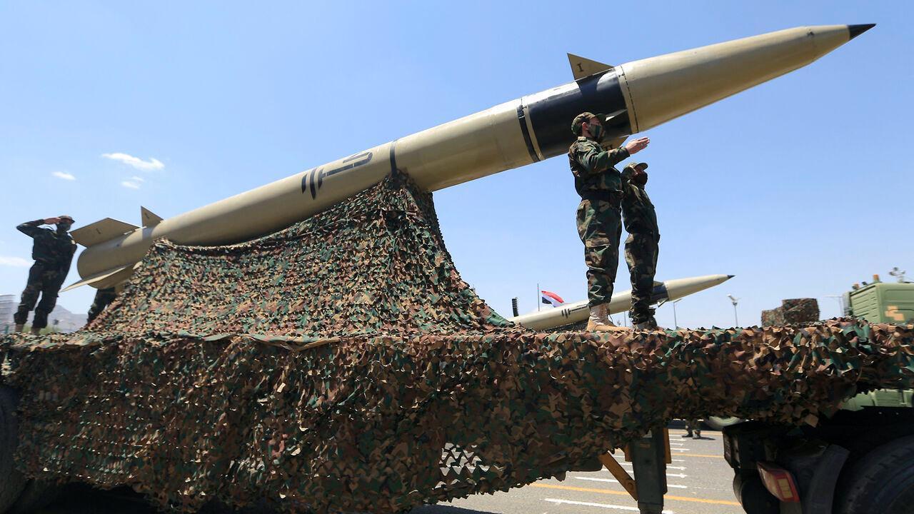 Houthis stand guard on a missile carrier during an official military parade marking the ninth anniversary of the Houthi takeover of the capital, Sanaa, Sept. 21, 2023. (AFP Photo)