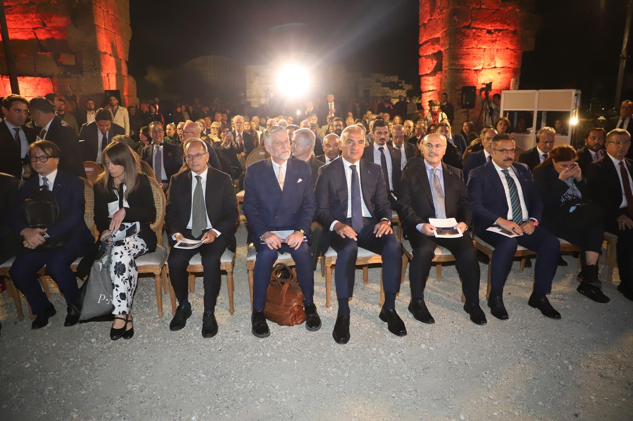 Turkish Culture and Tourism Minister Mehmet Nuri Ersoy and Italian Culture Minister Alessandro Giuli attend the 17th Italian Cultural Center Archaeology Symposium alongside officials and researchers in Hierapolis, Denizli, Türkiye, October 13, 2026. (AA Photo)