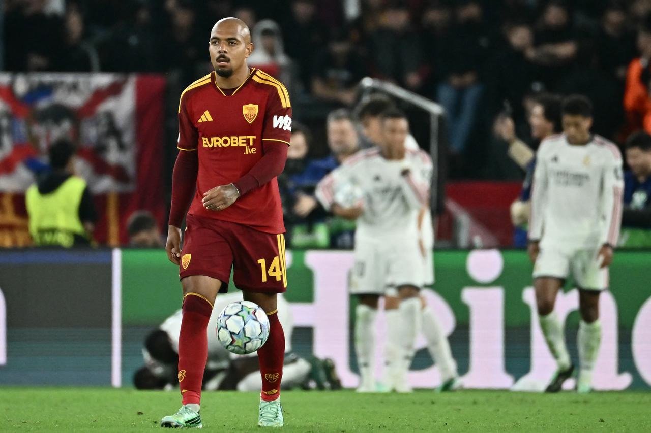 AS Roma's Dutch forward #14 Donyell Malen reacts after Real Madrid's German defender #22 Antonio Ruediger goal during the UEFA Champions League - 1st round day 2 football match between AS Roma and Real Madrid at the Olympic Stadium in Rome on October 14, 2026. (AFP Photo)