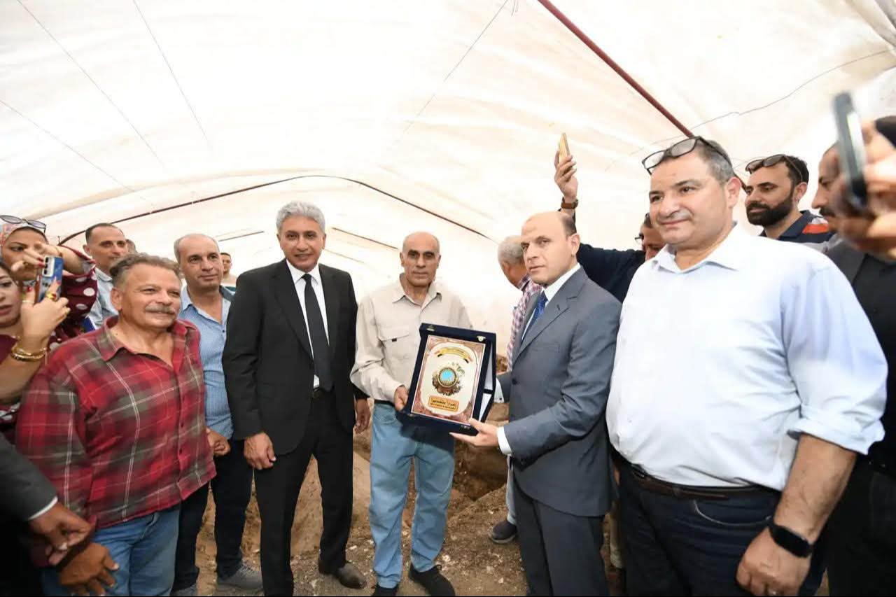 Egyptian officials honor a villager whose discovery of an inscribed stone led archaeologists to uncover colossal statues of Pharaoh Ramses II in Behbeit el-Hagar, Egypt, October 14, 2026. (Photo via Egypt's Ministry of Tourism and Antiquities)