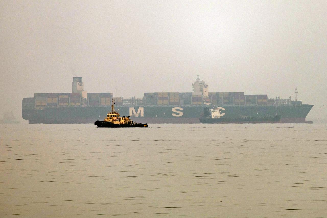 A vessel transits the Gulf of Oman off the coast of Khor Fakkan in the emirate of Sharjah in the east of the UAE on October 13, 2026. (AFP Photo)