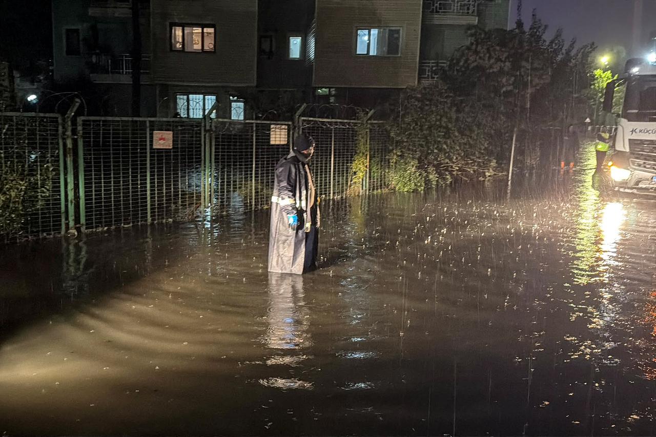 Severe torrential rainfall causes waterlogging and localized flash floods across streets and residential roads in the Kucukcekmece district of Istanbul, Türkiye, on October 14, 2026. (AA Photo)