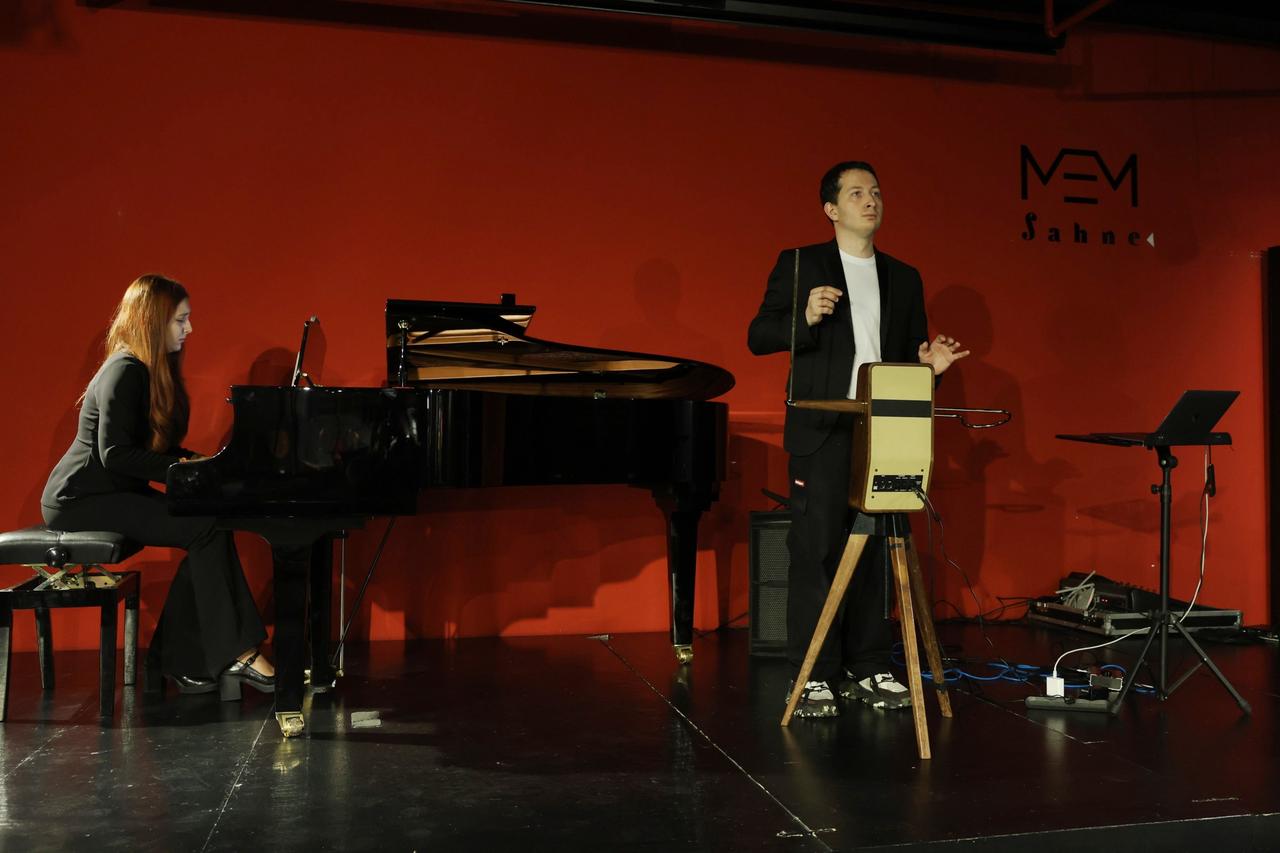 Peter Theremin, great-grandson of theremin inventor Leon Theremin, performs alongside a pianist at the MEM Sahne concert venue in Bursa, Türkiye, October 2026. (IHA Photo)