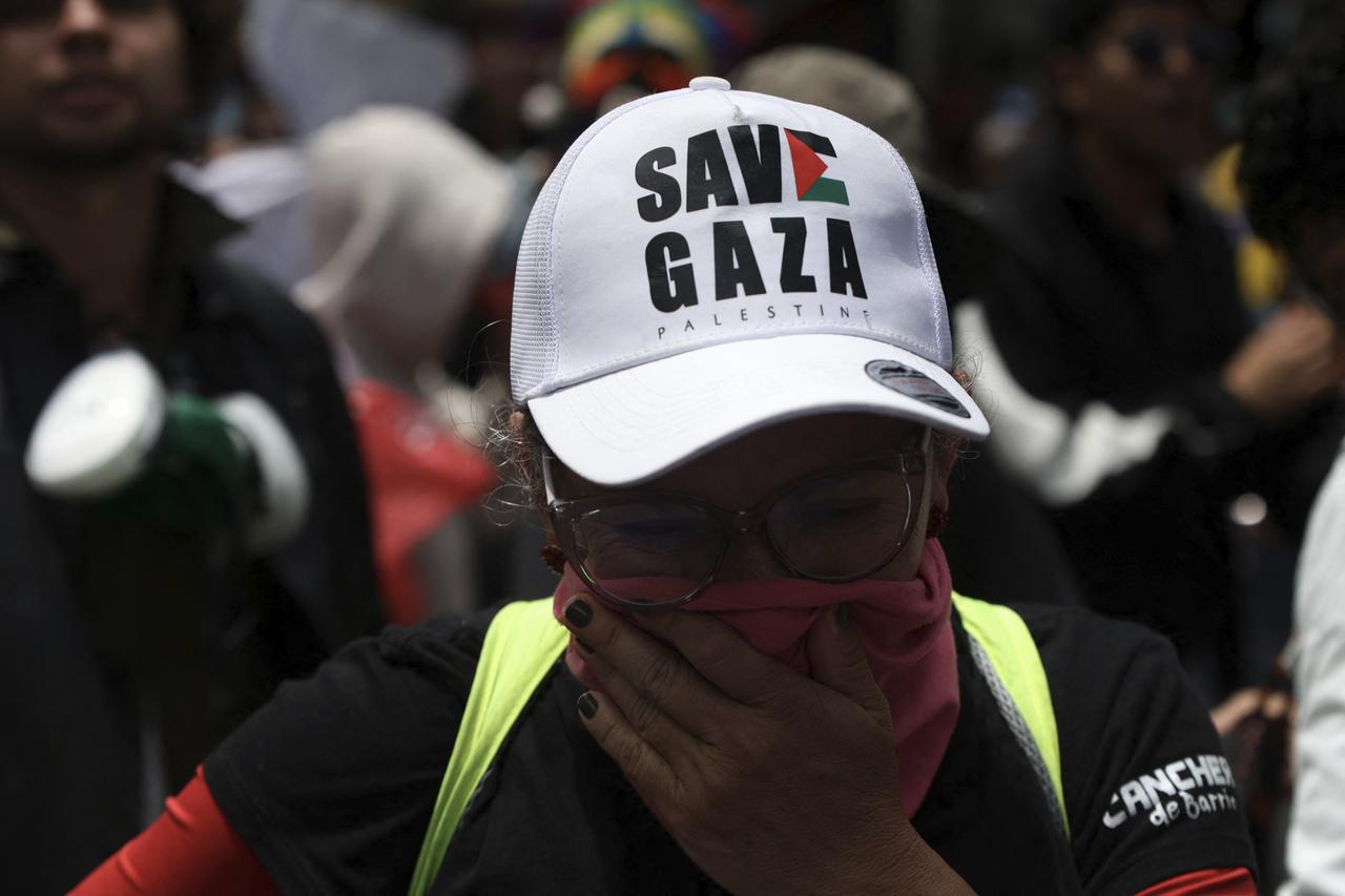 A demonstrator wearing a cap reading "Save Gaza" takes part in a protest against the government of Colombian President Abelardo de la Espriella in Bogota on Oct. 14, 2026. (AFP Photo)