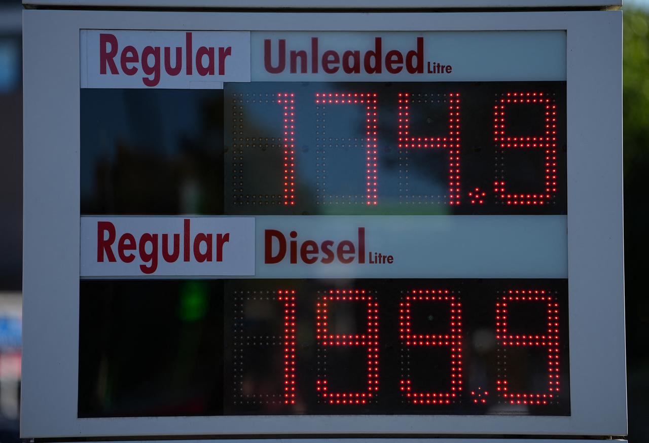 The price per litre of unleaded petrol and diesel fuels, with diesel at 199.9 pence, just under two GBP pounds sterling per litre, is displayed on sign outside a Shell petrol station in Tunbridge Wells on October 13, 2026. (AFP Photo)