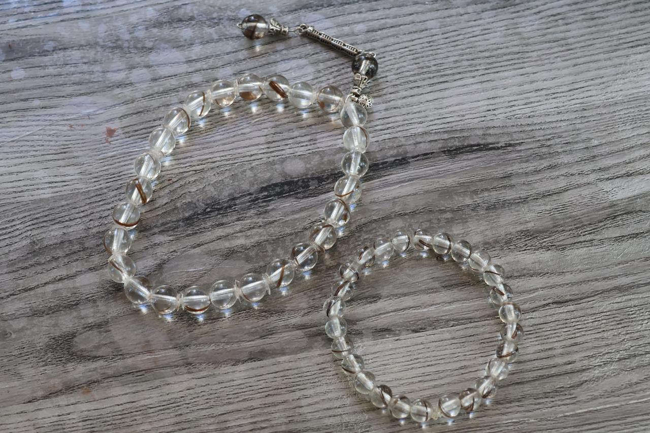 Handmade bracelets containing preserved strands of hair are displayed in Eskisehir, Türkiye, October 15, 2026. (IHA Photo)